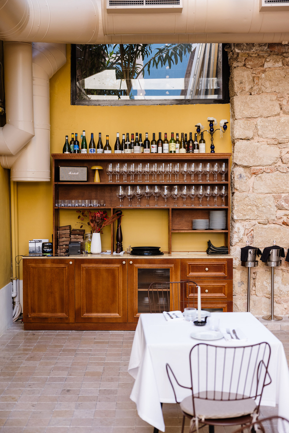Cozy wine bottle area of osteria mamma