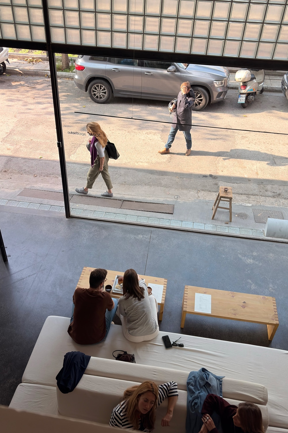 Guests enjoying the café’s self-service weekend bakery in the Psyrri flagship store.