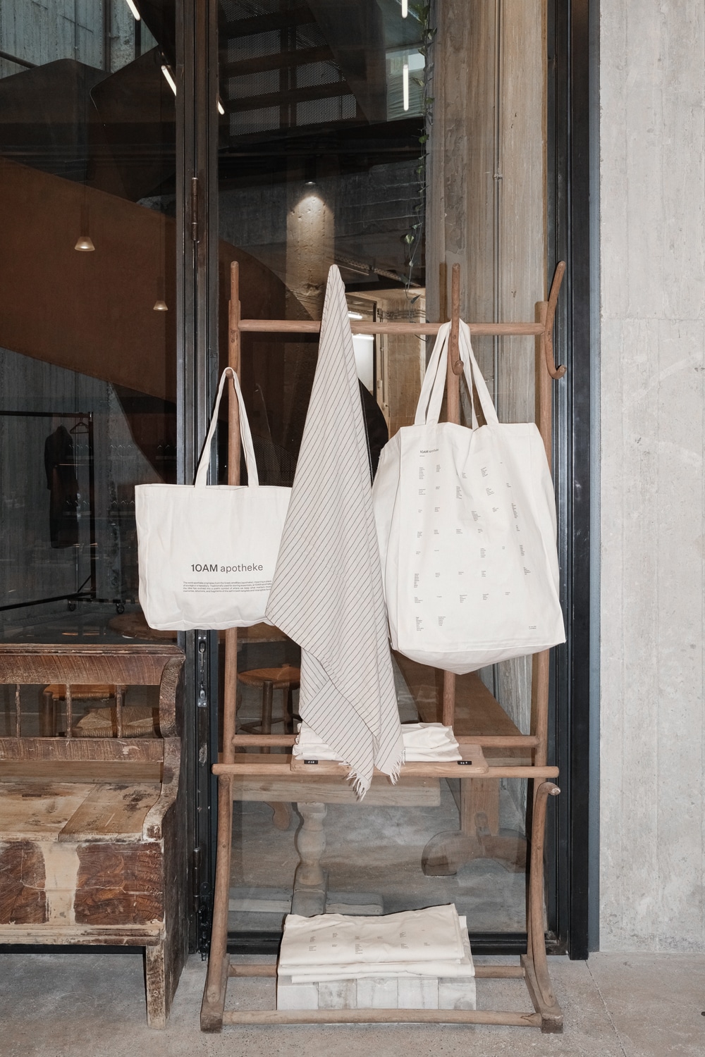 basement level of 1OAM apotheke showing warm lighting, textured surfaces and the brand’s design-led retail environment.