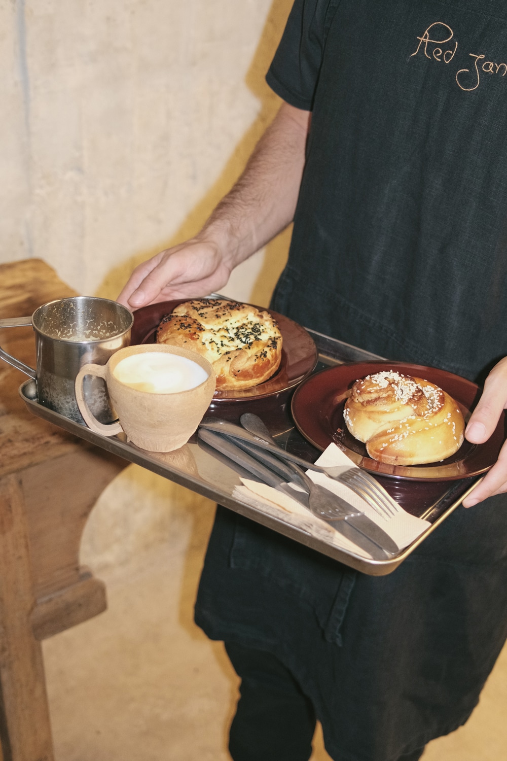 Freshly baked bread loaves of 1OAM apotheke café.