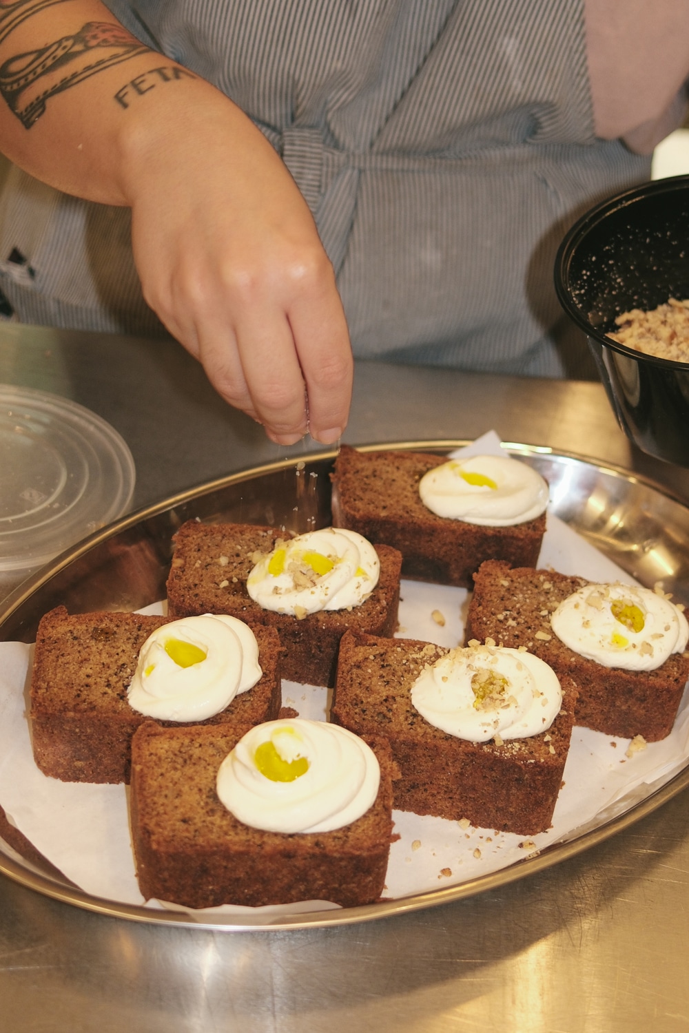 Slice of walnut cake made with 1OAM apotheke organic olive oil.