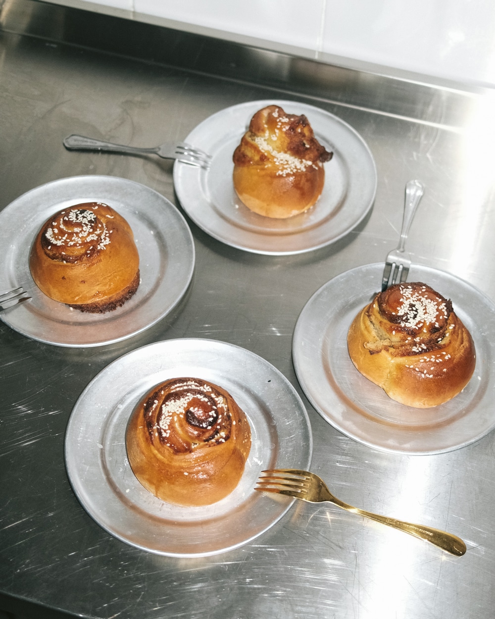 buns, presented on a minimal plate.