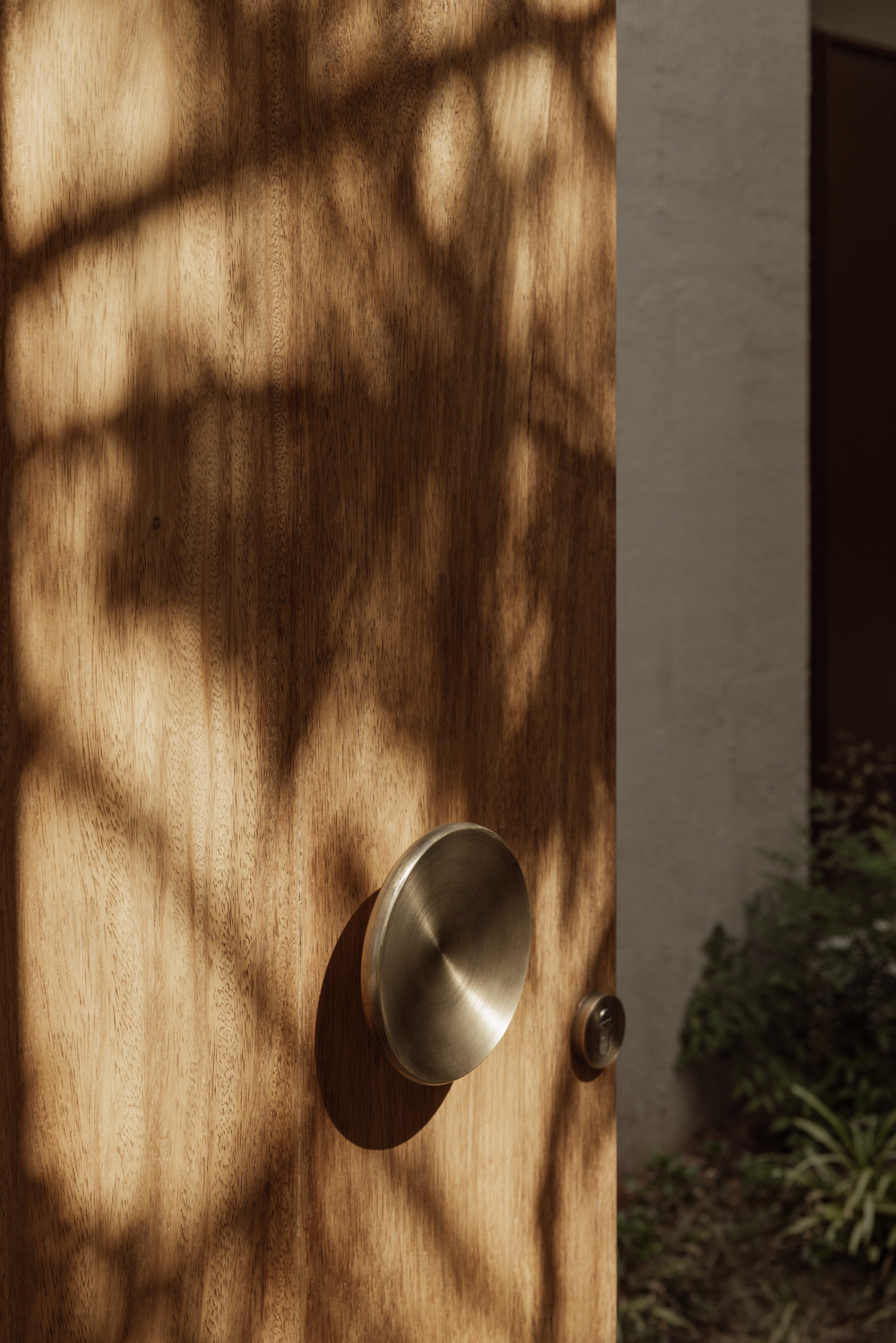 exterior wooden door of Block722’s Lumen residence