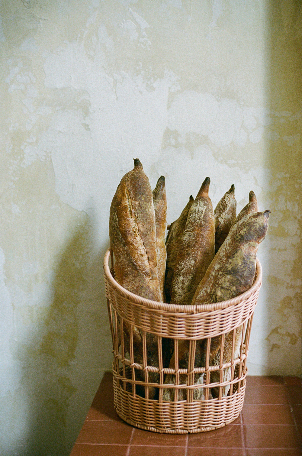 Freshly baked loaves in a basket at Hygge