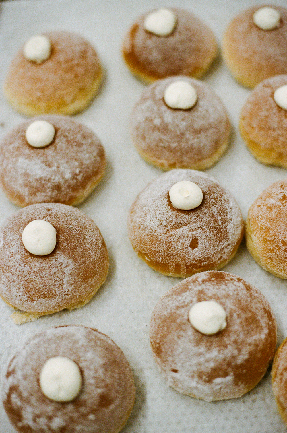 Seasonal semla bun filled with almond paste and whipped cream.