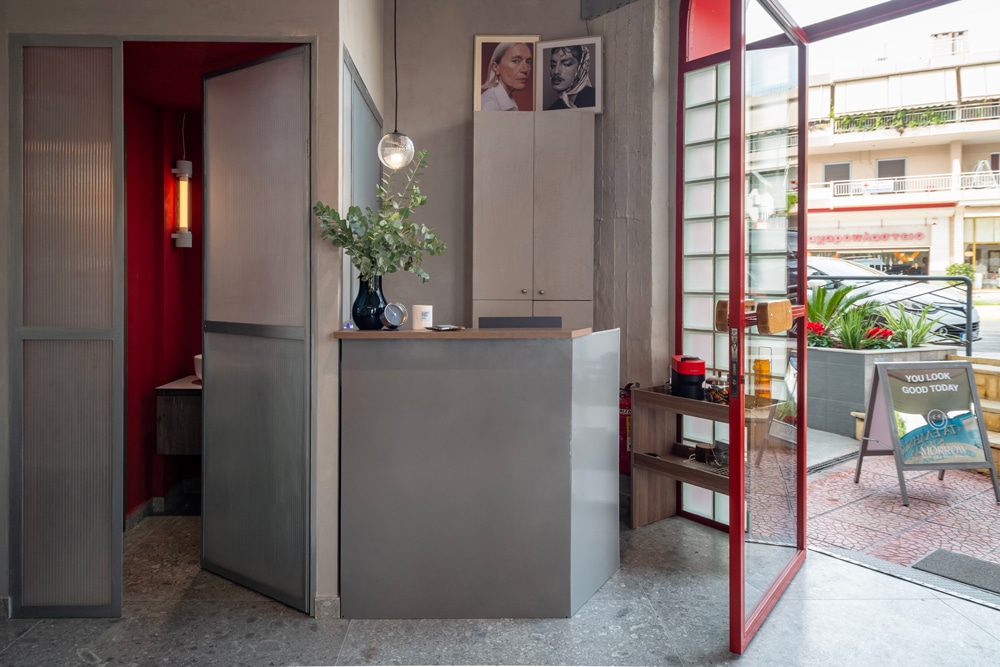 Tall integrated cabinetry providing discreet storage in the workspace