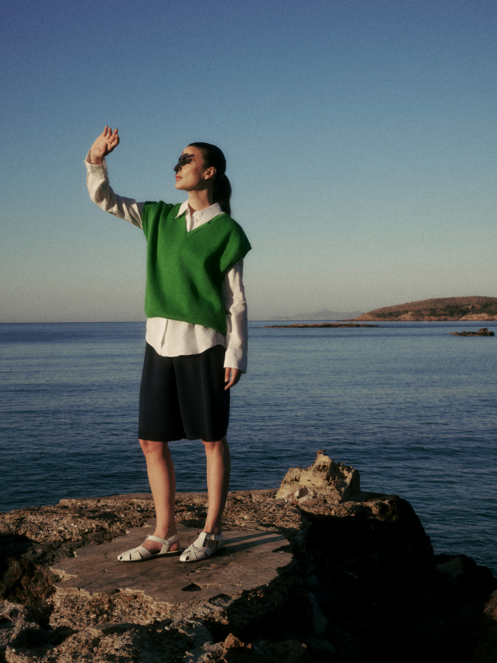 Model wearing green wool jumper from nonna lietta