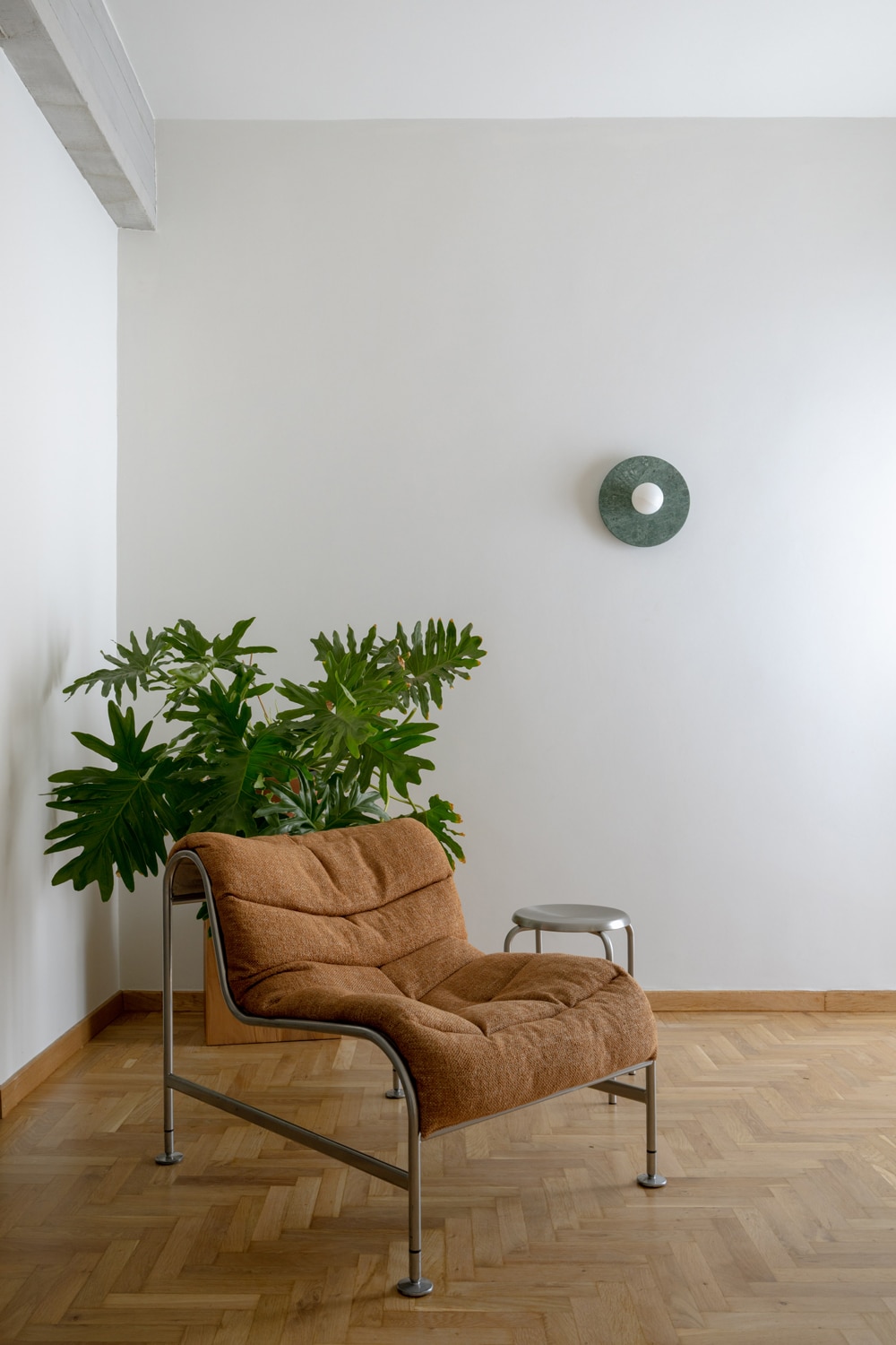 The living, dining and kitchen areas are combined within a single central space.