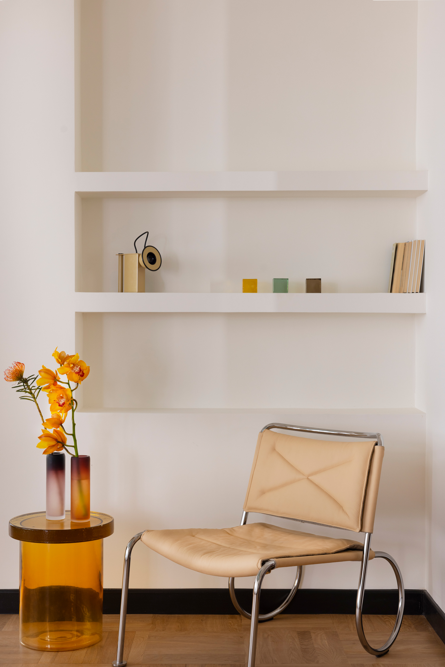Interior corner showing coloured ceiling and natural light across materials