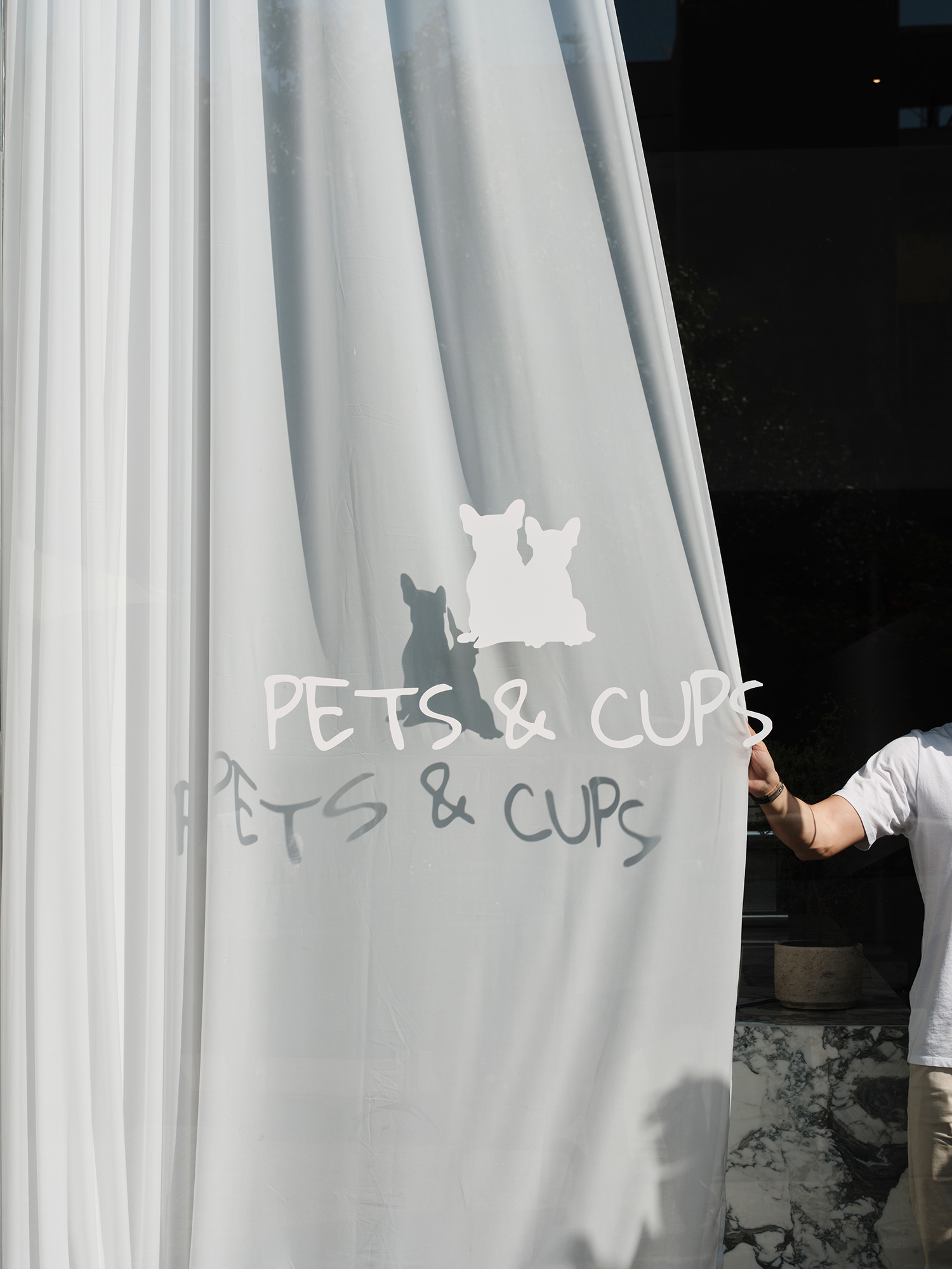 Pet grooming salon integrated into café and retail environment at Pets & Cups in Glyfada