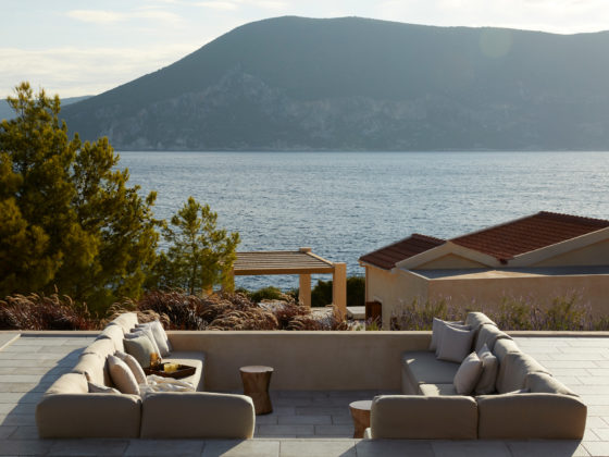 Exterior view of Emelisse Nature Resort villas in Kefalonia with Ionian Sea backdrop