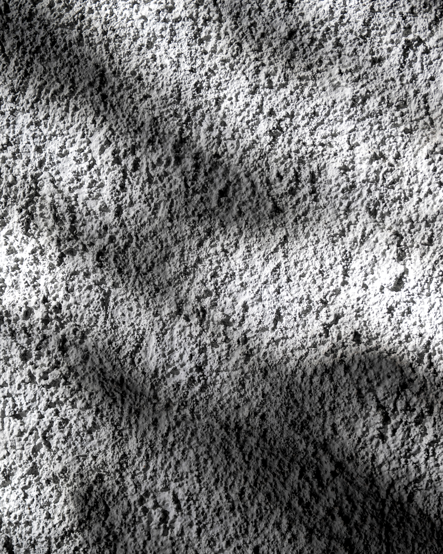 Detail of rough cast plaster wall