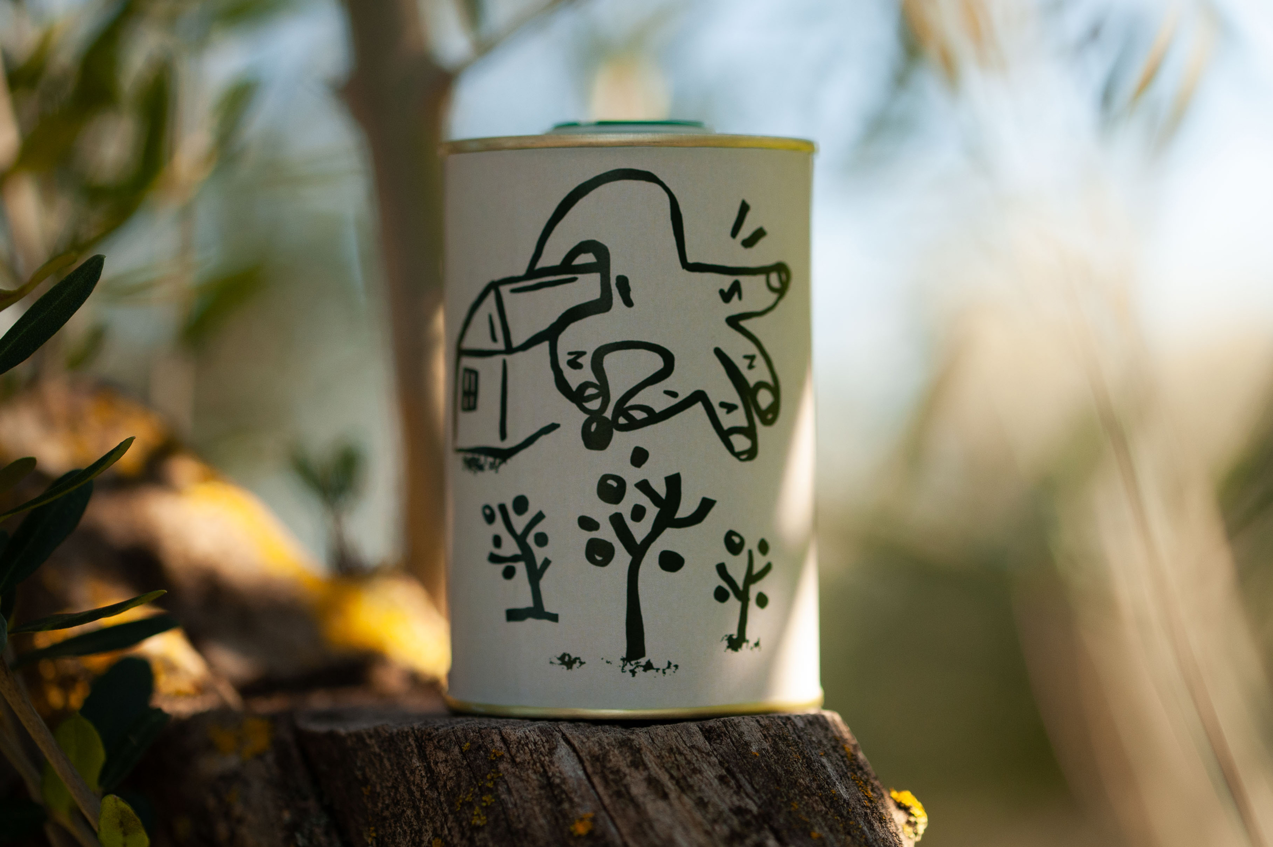 Handwritten illustration on Slab olive oil label showing hand picking olives
