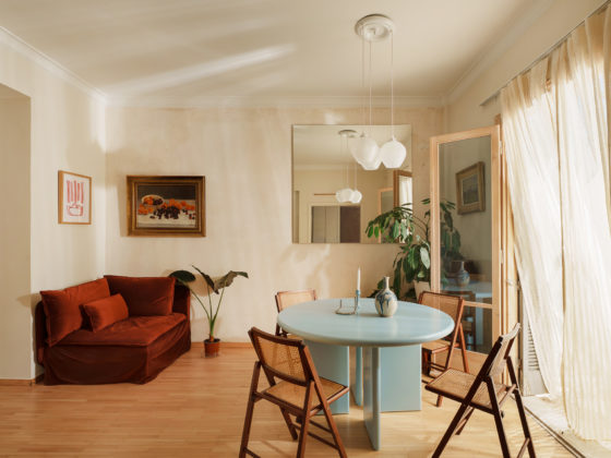 Living space with timber floors in renovated Patissia apartment