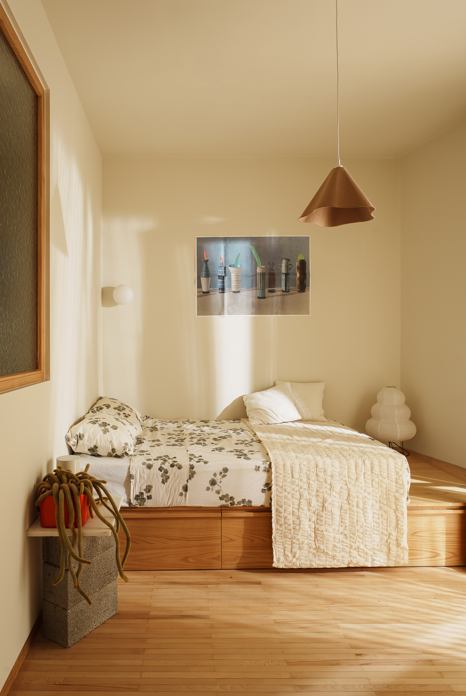 Bedroom with integrated storage and timber flooring in Athens apartment
