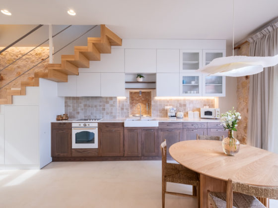 View of 1920s Cretan stone house topped with lightweight contemporary addition