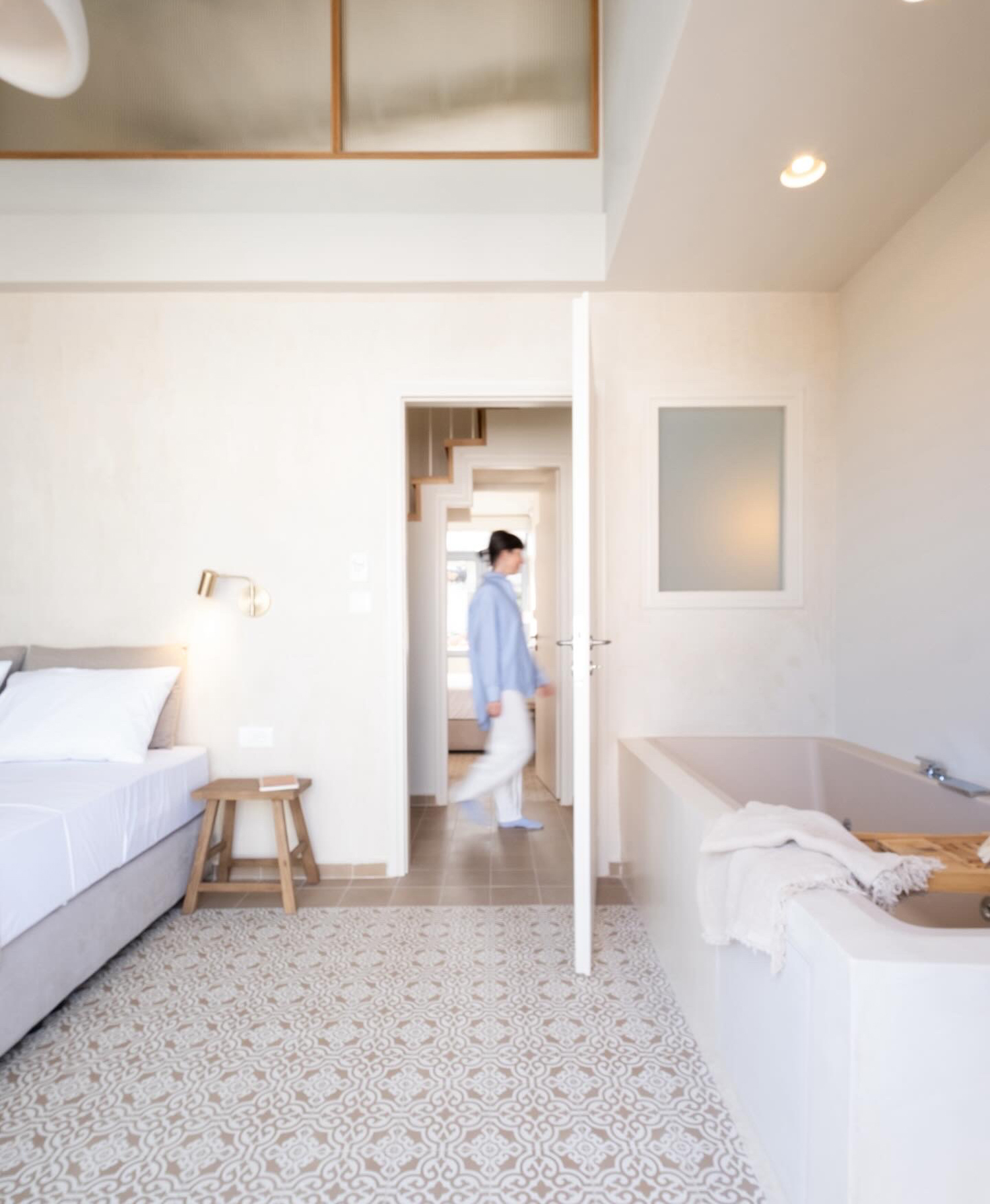 Loft space under timber roof with natural light and simple finishes