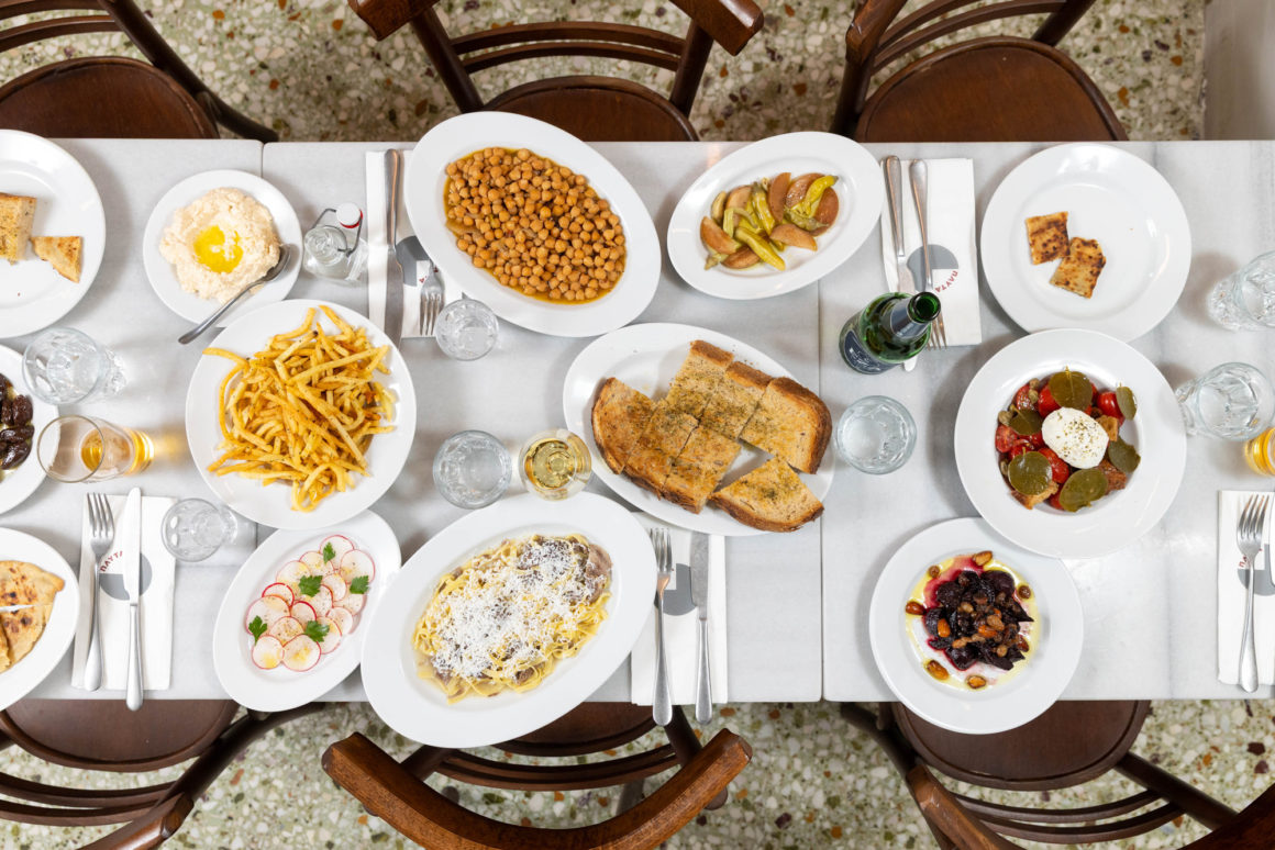 Table setting at Plyta highlighting simple presentation and Greek dishes