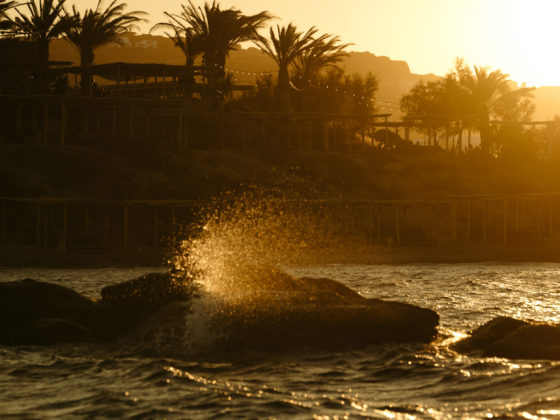 Scorpios Mykonos at sunset, capturing the atmosphere behind the Inner Tides summer playlist curated by Lannka.