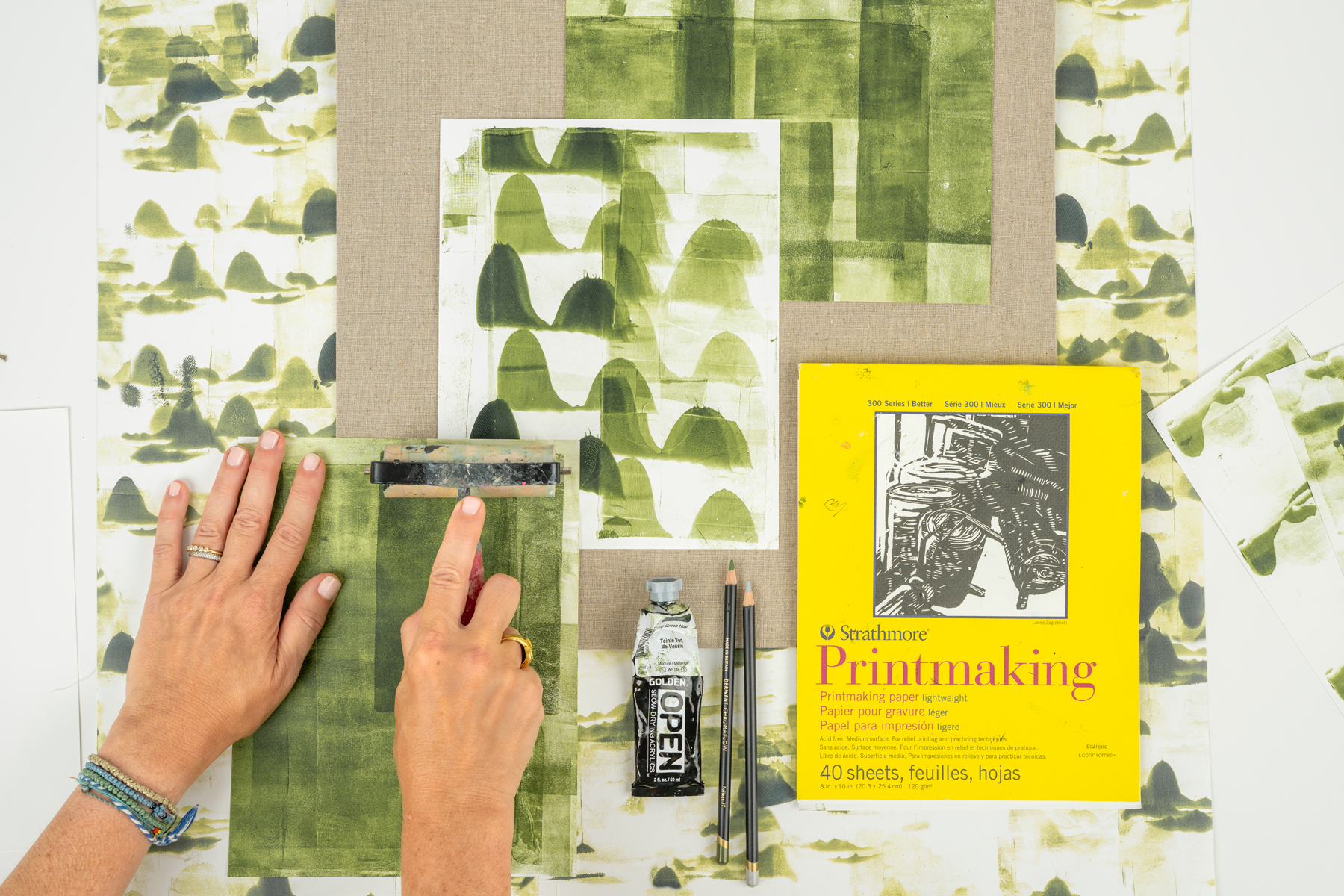 Theodora Miller in her studio creating original painted artworks for The Ancestral Collection