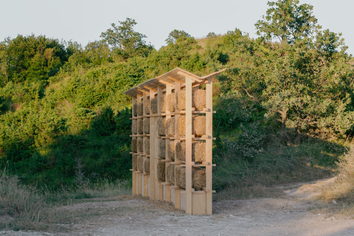 Metabolic Wall timber and hay pavilion by Akro Studio and Studio Felix Verheyden in the Italian countryside.